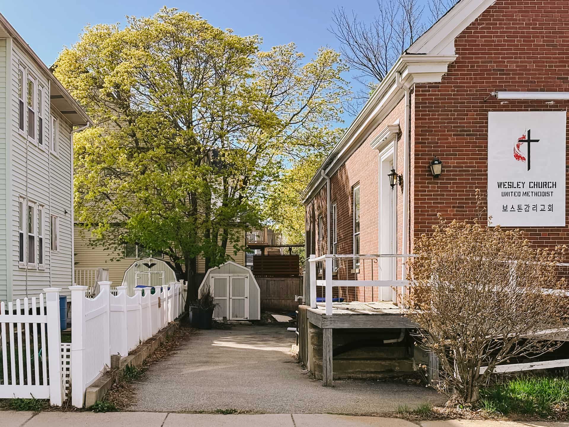 Exterior side entry and existing property sign